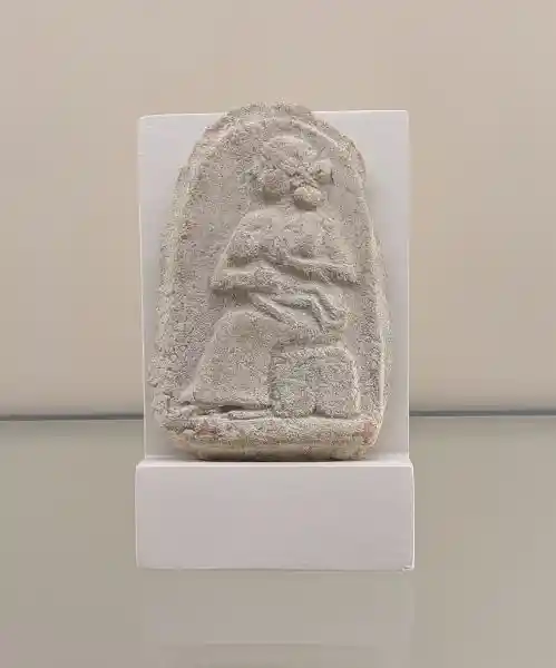 Rear: Terracotta relief of a woman with child, 19th/17th Century BC (purchase), located at the Pergamon museum